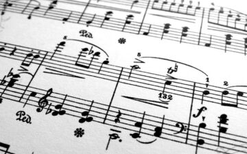 Sheet music with octaves and scales.